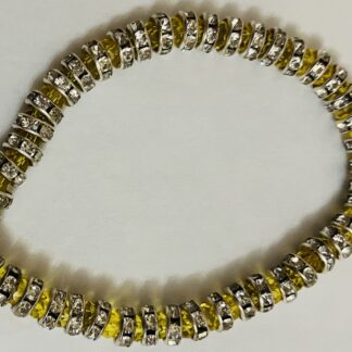 Braccialetto con perline bicolore giallo e argentato
