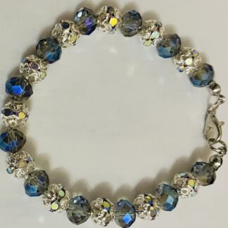 Braccialetto con perline bicolore smeraldo e argentate